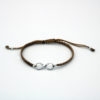 Infinity silver bracelet with adjustable cord